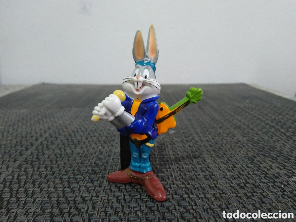 Figuras de Goma y PVC: FIGURA PVC BUGS BUNNY CON MICROFONO Y GUITARRA TM WARNER BROSS HAWAI DIBUJOS ANIMADOS LOONEY TUNES