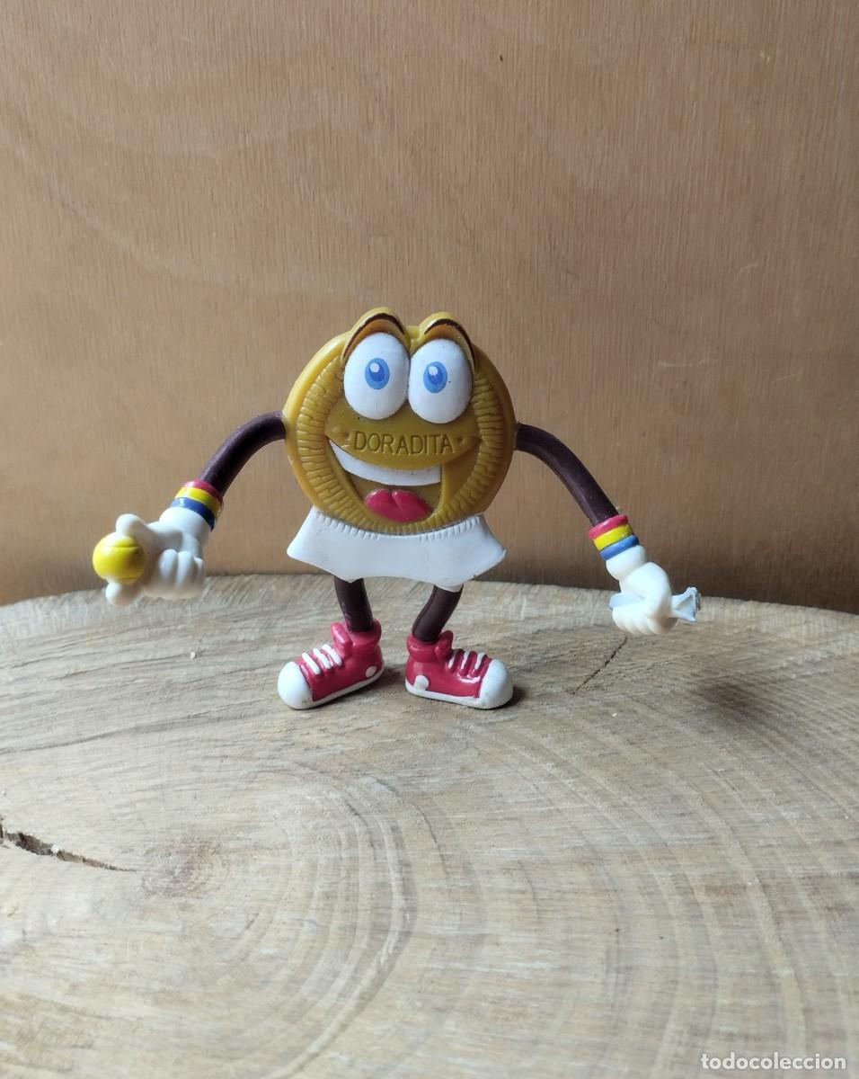 Gummi- und PVC-Figuren: Figura goma PVC de Galleta Doradita tenista sin raqueta.
