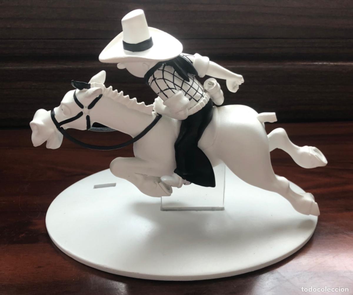 Rubber and PVC Figures: Figura Tint&iacute;n cowboy al galope Tint&iacute;n en Am&eacute;rica