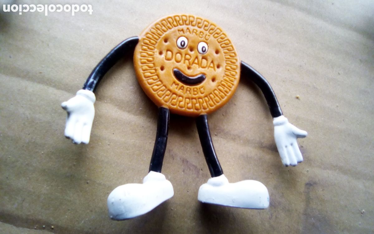 Figuras de Goma y PVC: Galleta Doradita, promocional Marb&uacute; Dorada. Mide 78 mm.