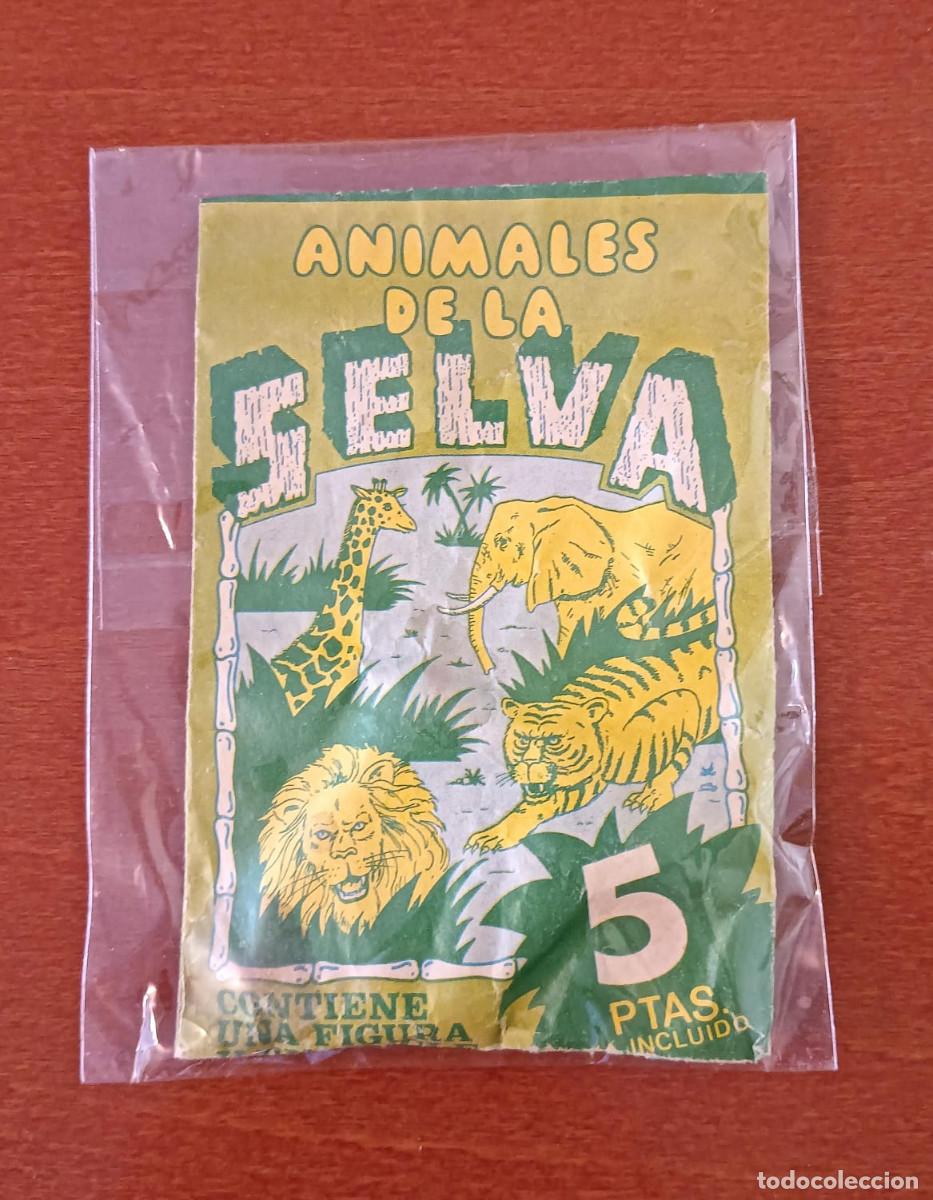 Figuras de Goma y PVC: Dunkin Sobre Animales de la Selva Contiene una figura y un chicle no comestible