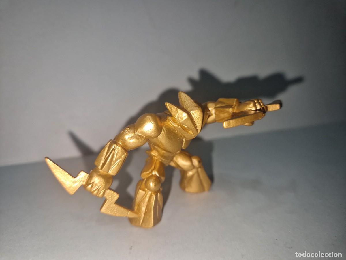 Figuras de Goma y PVC: GORMITI SERIE ORO DORADO