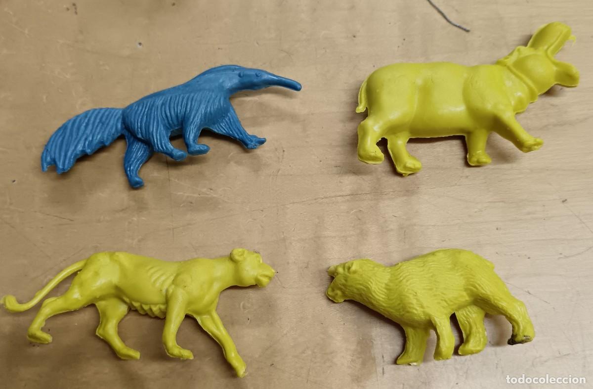 Figuras de Goma y PVC: 4 FIGURAS SURTIDAS ANIMALES DETERGENTES PERSAN