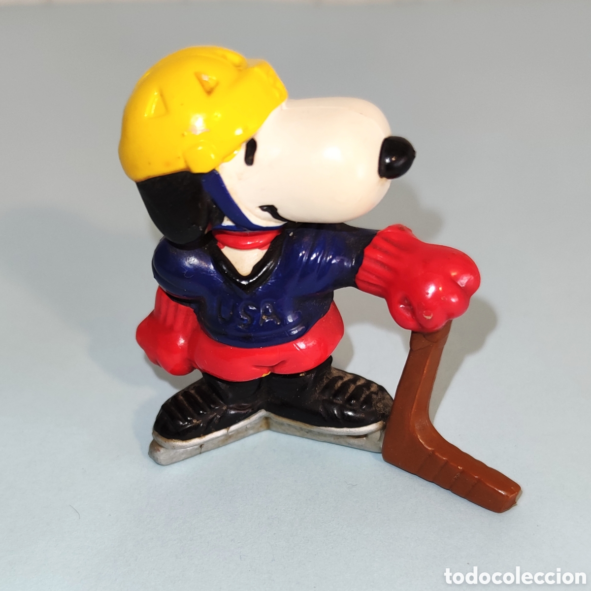 Figuras de Goma y PVC: Figura PVC Peanuts Deportes: Snoopy - Jugador de hockey sobre hielo camiseta azul USA