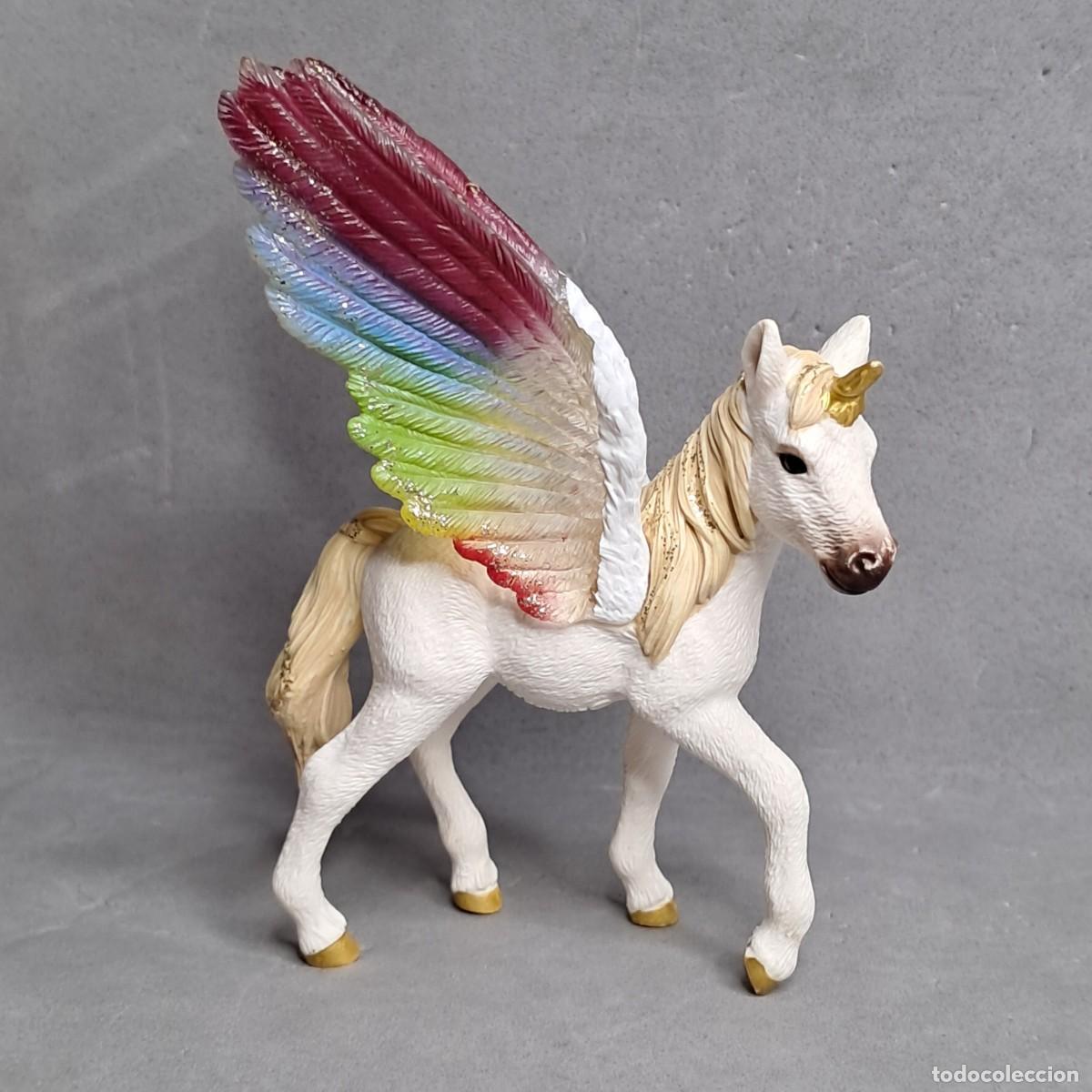 Figuras de goma y PVC: Antigua figura de un potro Unicorno alas Arco Iris de Schleich, molde de 2013
