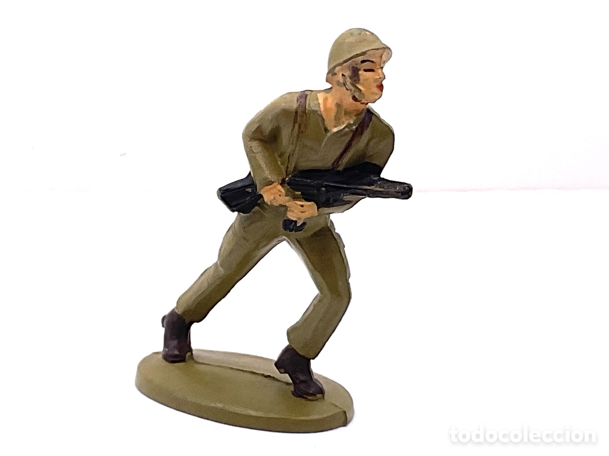 Figuras de goma y PVC: ANTIGUA FIGURA DE SOLDADO CON SUBFUSIL. MARCA JIM. 55.MM
