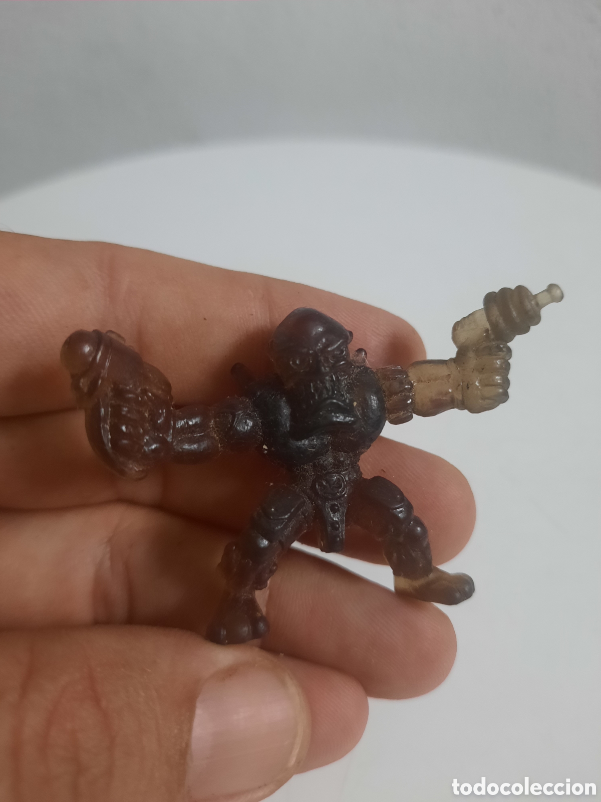 Figuras de goma y PVC: Figura de acci&oacute;n de Aknar Shadow de la serie &rdquo;Fistful of Power&rdquo; lanzada por Moose Toys en 2004.