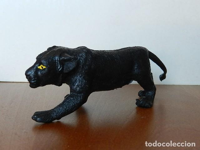 Figuras de goma y PVC: Pantera figura de PVC Marcado con una estrella color negro con ojos amarillos