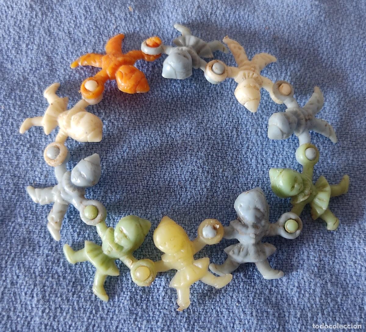 Figuras de goma y PVC: PULSERA DE GNOMOS DUNKIN A&Ntilde;OS 60