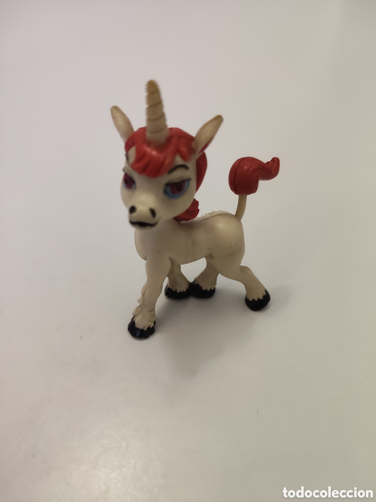 Gummi- und PVC-Figuren: Figura de goma PVC El unicornio Uni serie TV dragones y mazmorras , comic Spain