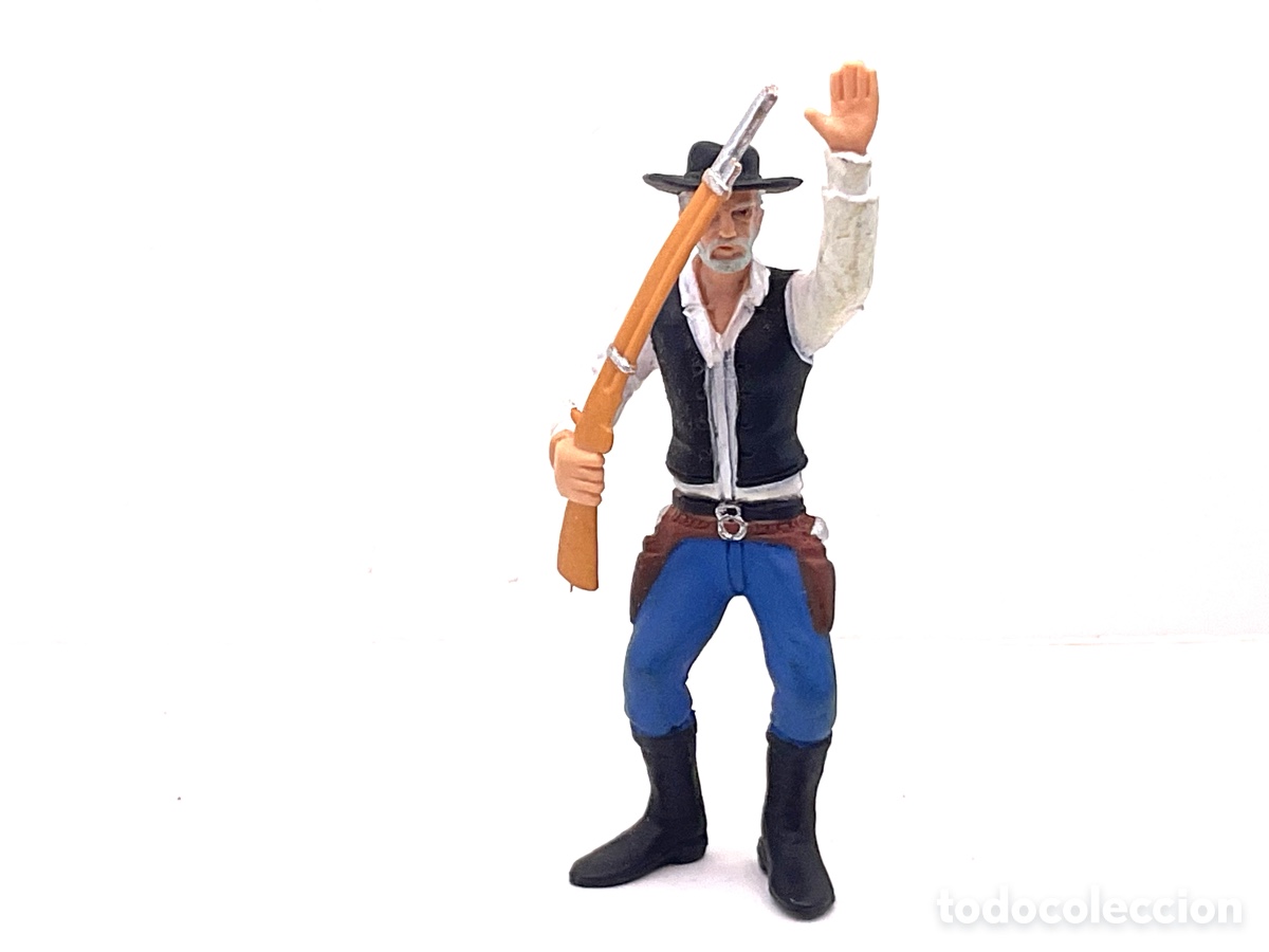 Figuras de goma y PVC: Figura del Oeste Comansi. Cowboy, Conductor de Caravanas con F&uacute;sil. IV Epoca de Comansi.