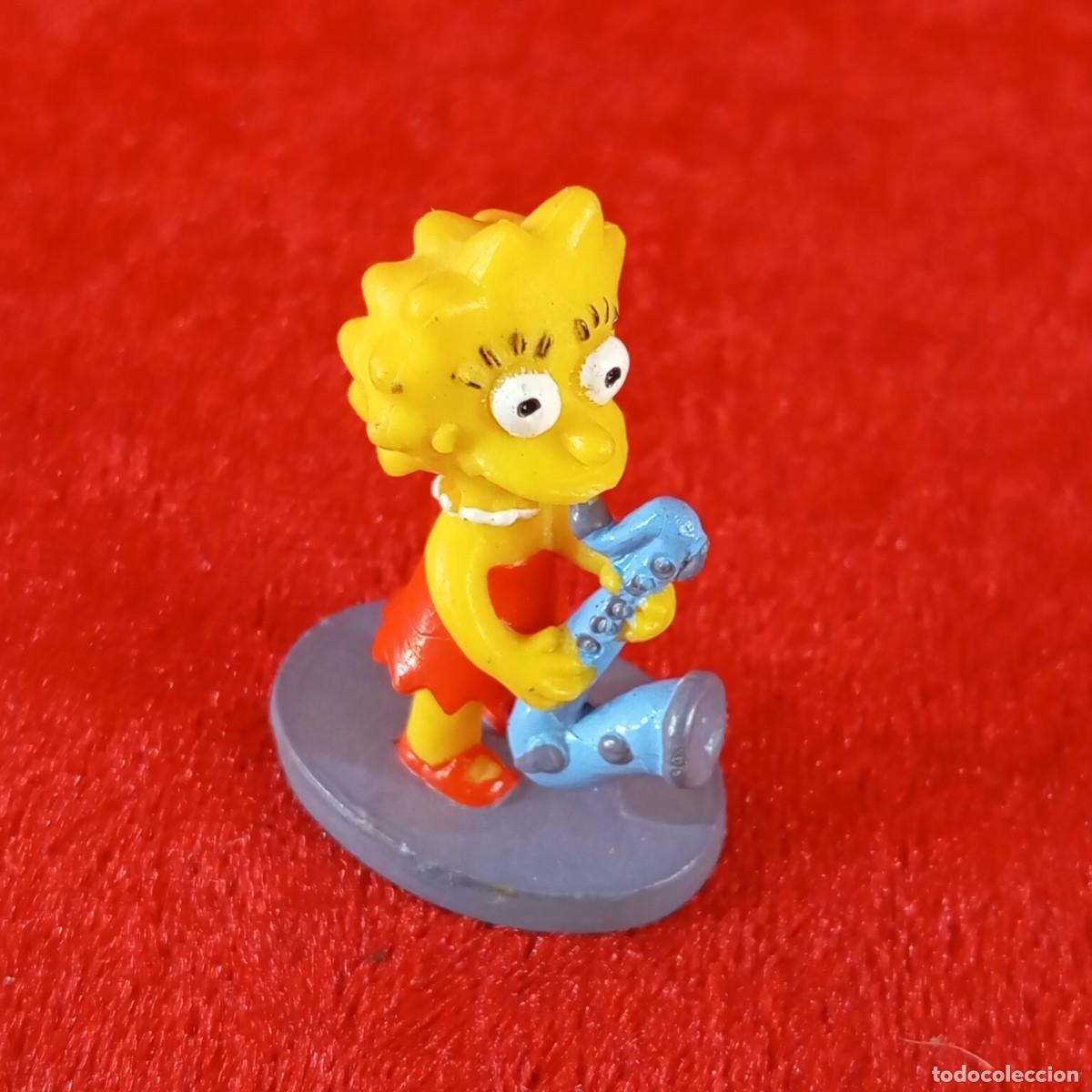 Figuras de goma y PVC: FIGURA DE PVC - LISA SIMPSON CON SAXOF&Oacute;N AZUL - LOS SIMPSON - BURGUER KING - 4 X 2,5 CM / 2118