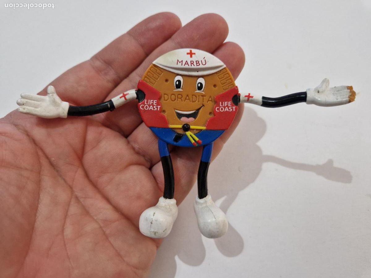 Figuras de goma y PVC: antigua figura de goma alambre flexible promocional galletas Marbu doradita a&ntilde;os 90