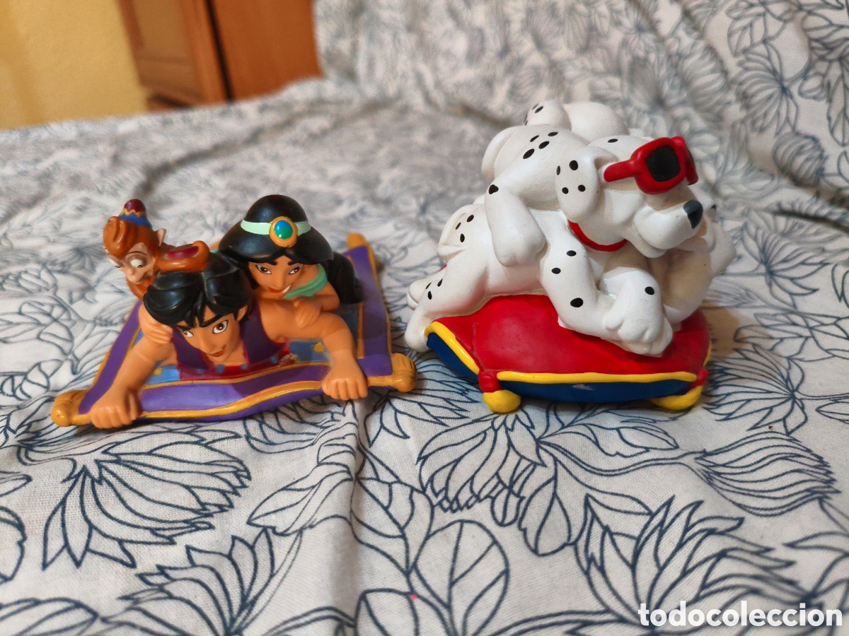 Figuras de goma y PVC: Tapones de colonia antiguos d&aacute;lmatas aladin