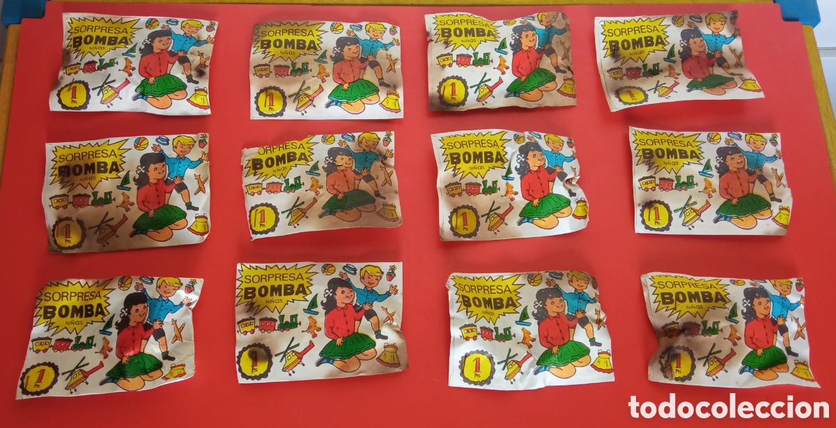 Figuras de goma y PVC: LOTE DE 12 SOBRES SORPRESA BOMBA NI&Ntilde;AS 1 PTA CON RECORTABLE EN REVERSO.SIN ABRIR 70'S.