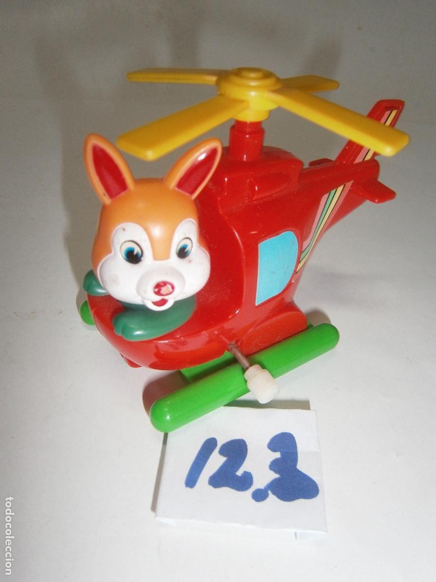 Figuras de goma y PVC: HELICOPTERO A CUERDA CON CONEJO DE PILOTO