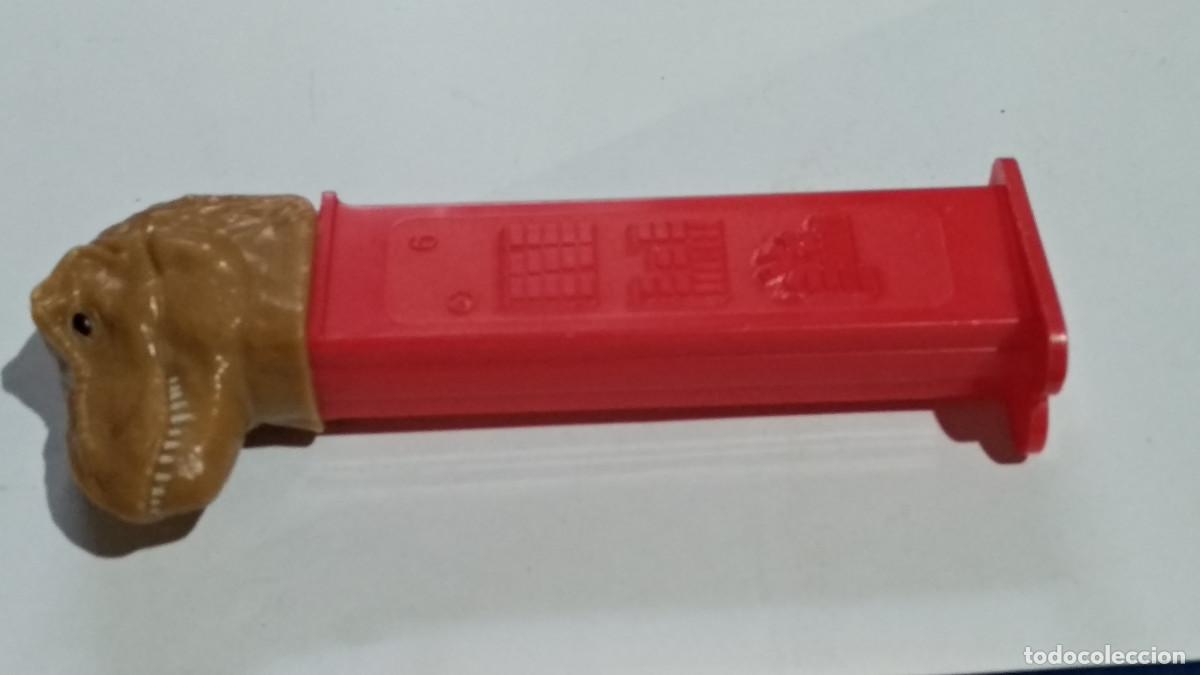 Figuras de goma y PVC dispensador PEZ: JURASSIC PARK DISPENSADOR DE CARAMELOS PEZ DINOSAURIO