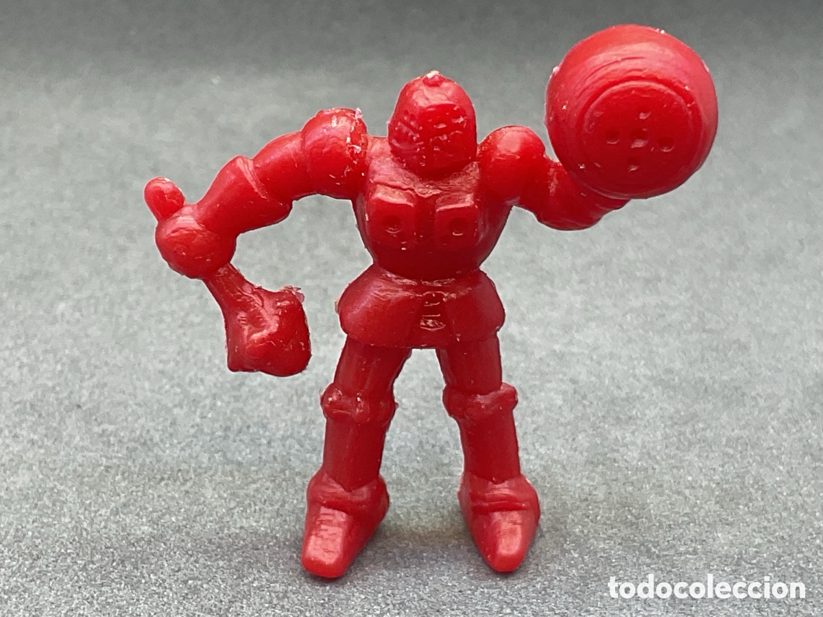 Figuras de goma y PVC: Antigua Figurita Dunkin de la Serie Robots y Naves. Promocional de Panrico. Color Rojo.