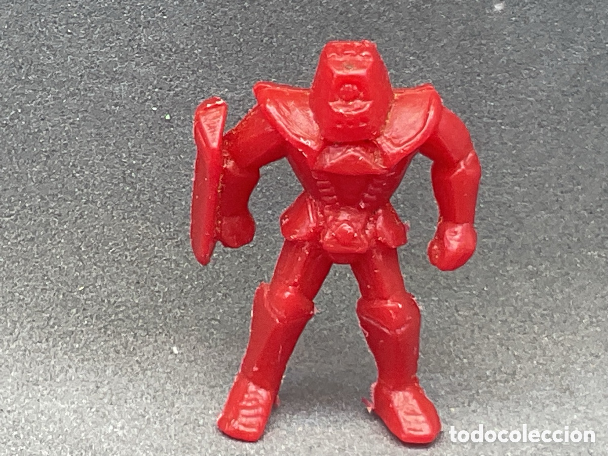 Figuras de goma y PVC: Antigua Figurita Dunkin de la Serie Robots y Naves. Promocional de Panrico. Color Rojo.