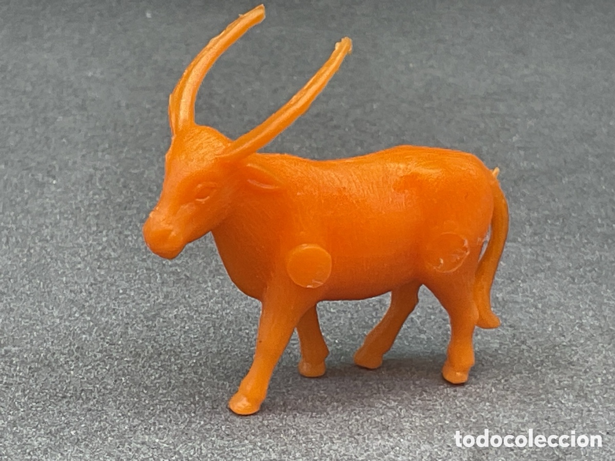 Figuras de goma y PVC: Figura Dunkin . Colecci&oacute;n Fieras del zoo. Color Naranja. Promocionales Chicles Dunkin