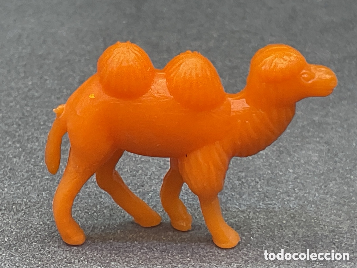 Figuras de goma y PVC: Figura Dunkin . Colecci&oacute;n Fieras del zoo. Color Naranja. Promocionales Chicles Dunkin