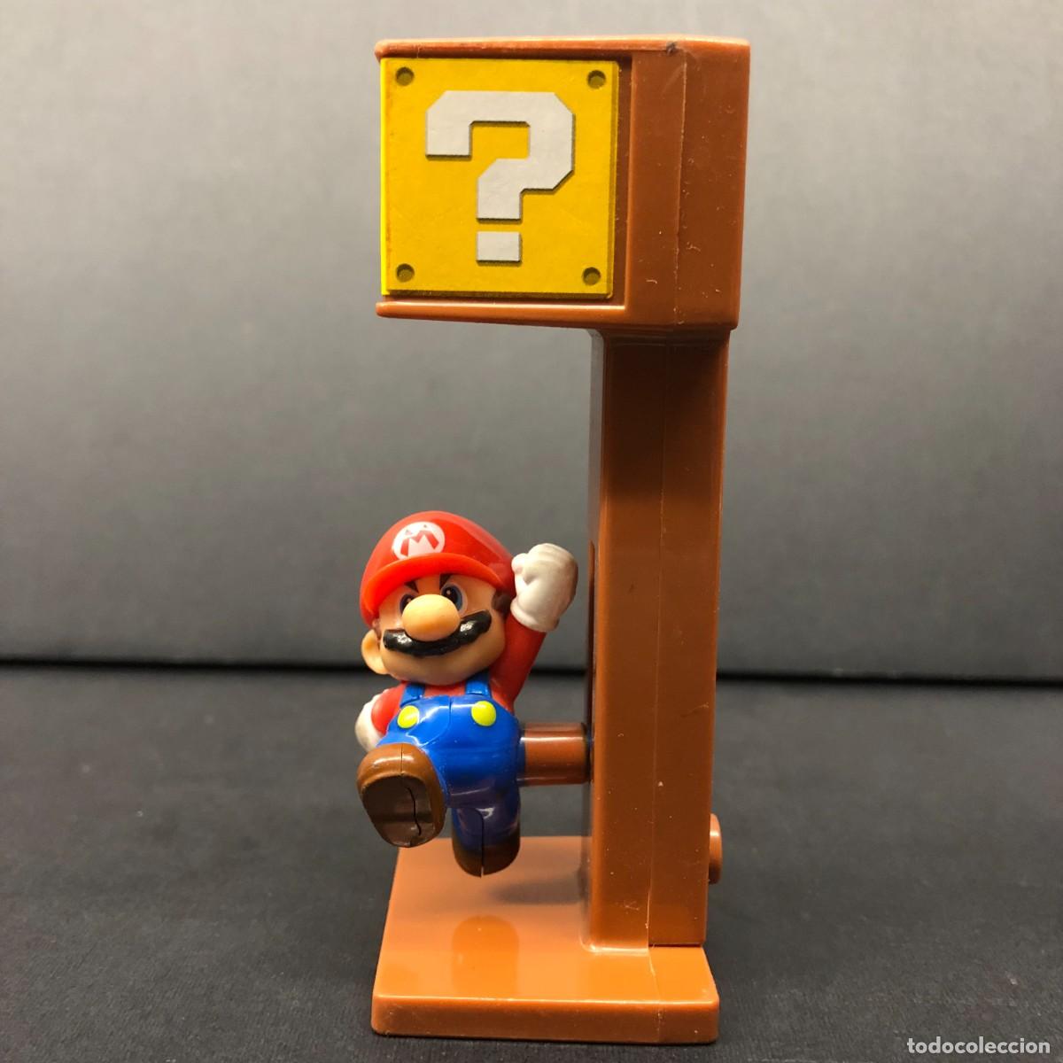 Figuras de goma y PVC: FIGURA DE PVC - MARIO CON EL BLOQUE ? - INTERACTIVO - NINTENDO - MC DONALD'S - 10 X 4 CM / 582