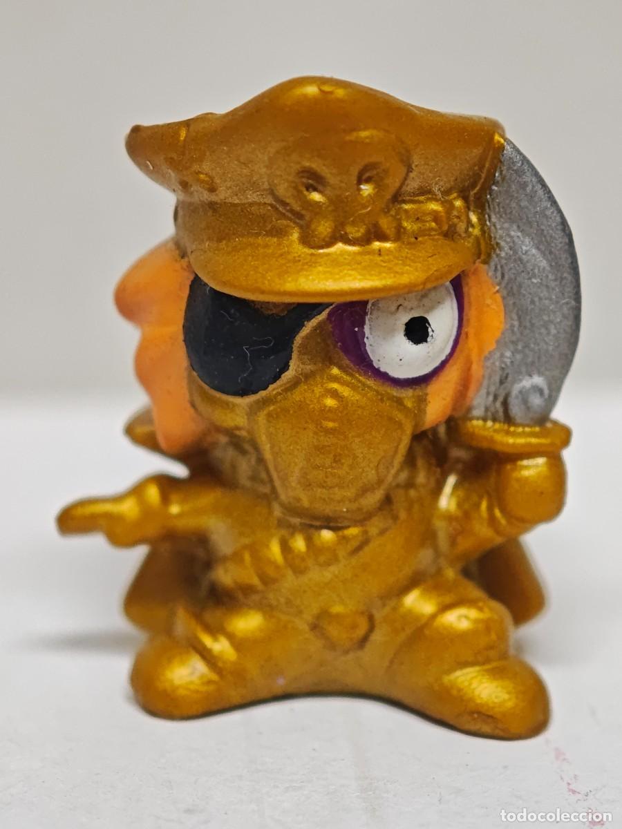 Figuras de goma y PVC: MU&Ntilde;ECO FIGURA ZOMLINGS DORADO NAGIX BOX