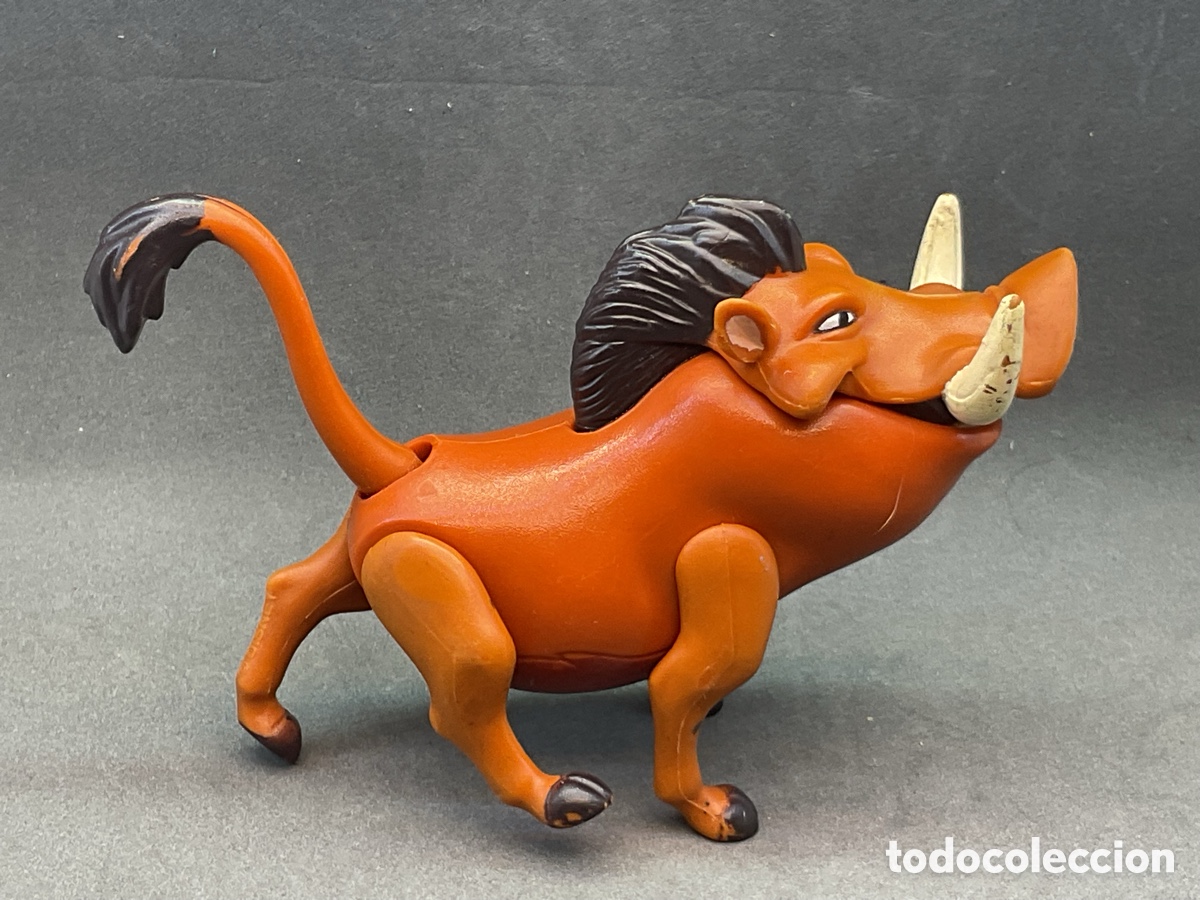 Figuras de goma y PVC: FIGURITA ARTICULADA DE PUMBA . PERSONAJE DE LA PELICULA EL REY LEON. DISNEY.