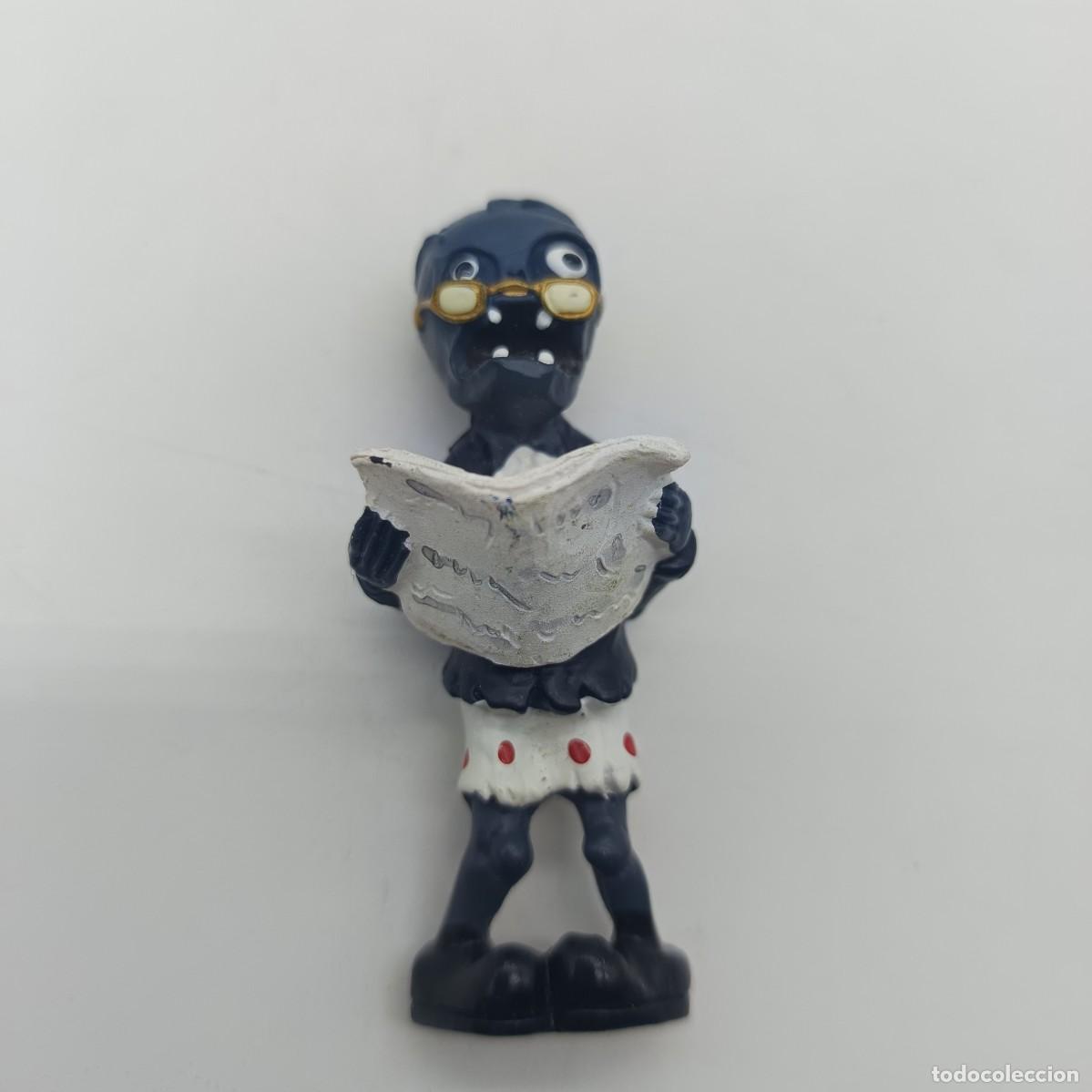 Figuras de goma y PVC: Figura Zombi lector &ndash; Plants vs. Zombies &ndash; PVC