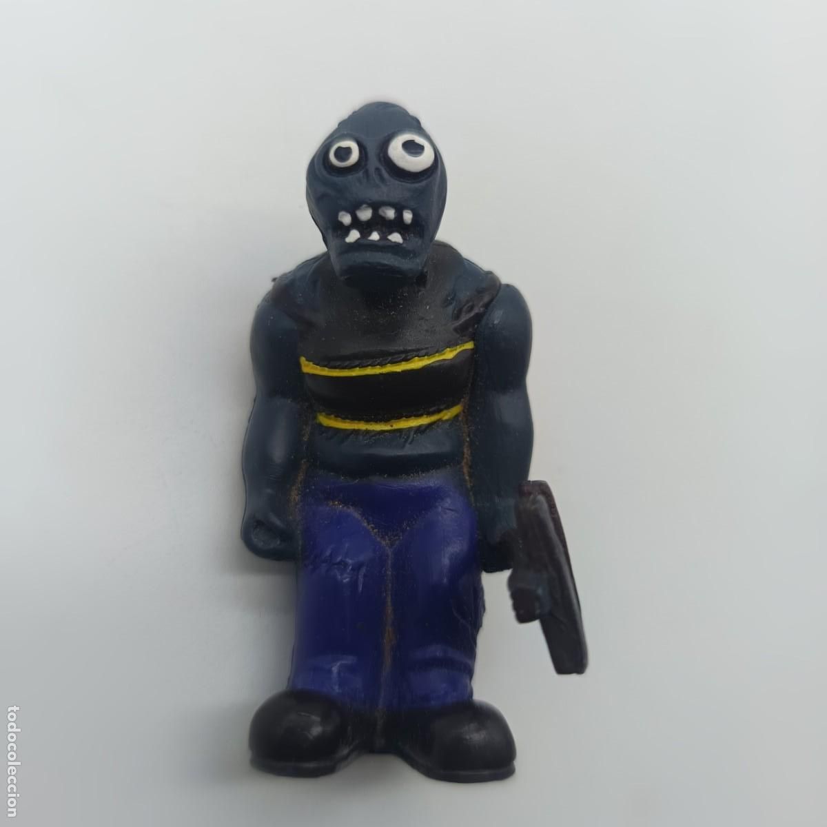 Figuras de goma y PVC: Figura Zombi con arma de madera y beb&eacute; zombi &ndash; Plants vs. Zombies &ndash; PVC Descripci&oacute;n SEO