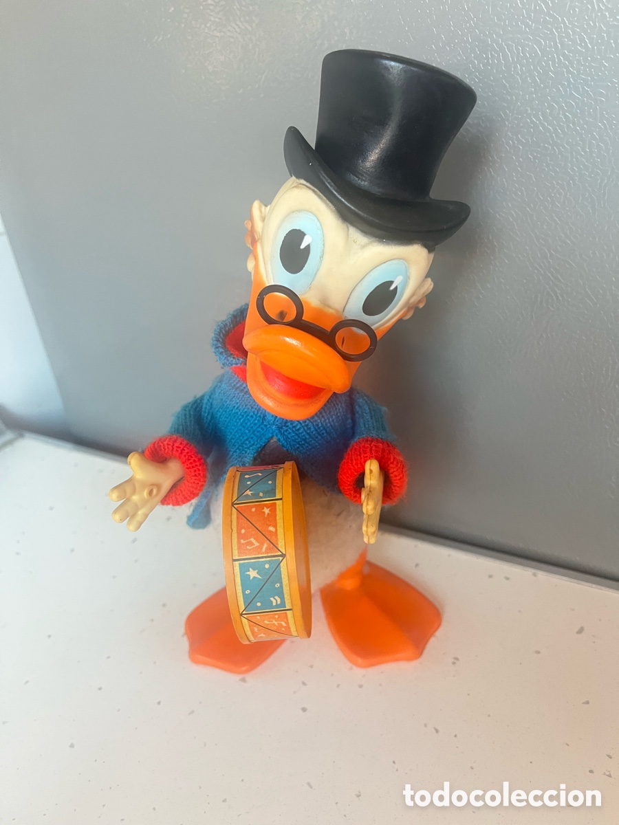 Figuras de goma y PVC: Antiguo mu&ntilde;eco, t&iacute;o Gilito de cuerda, Disney