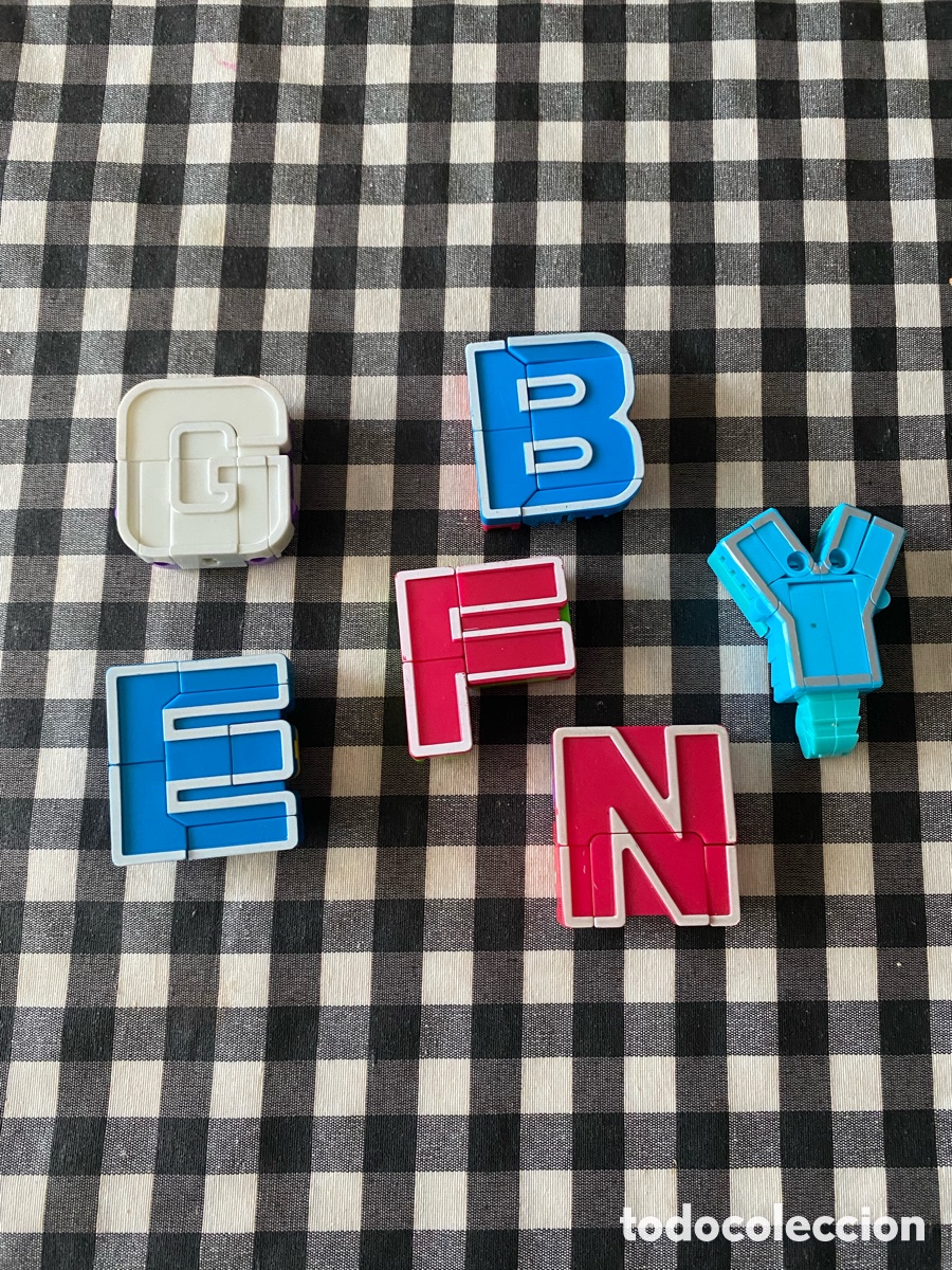 Figuras de goma y PVC: Lote de 6 letras transformables alphabots