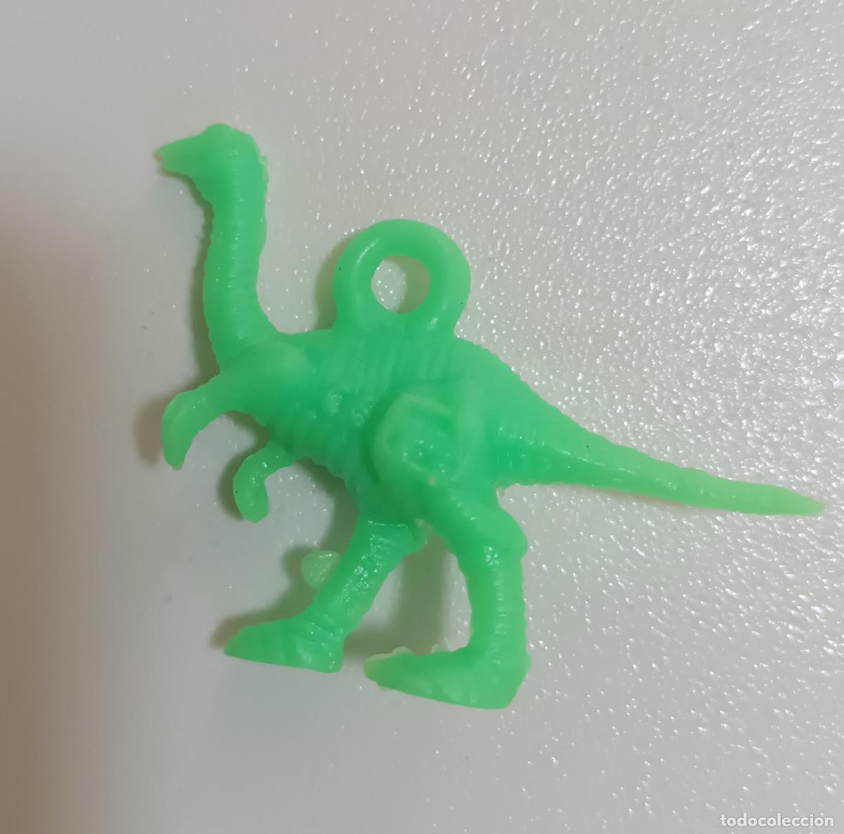 Figuras de goma y PVC: COLGANTE GREFUSA comansi JURASSIC PARK PARQUE JURASICO PREMIUM DUNKIN DUNKY FIGURA color gallimimus