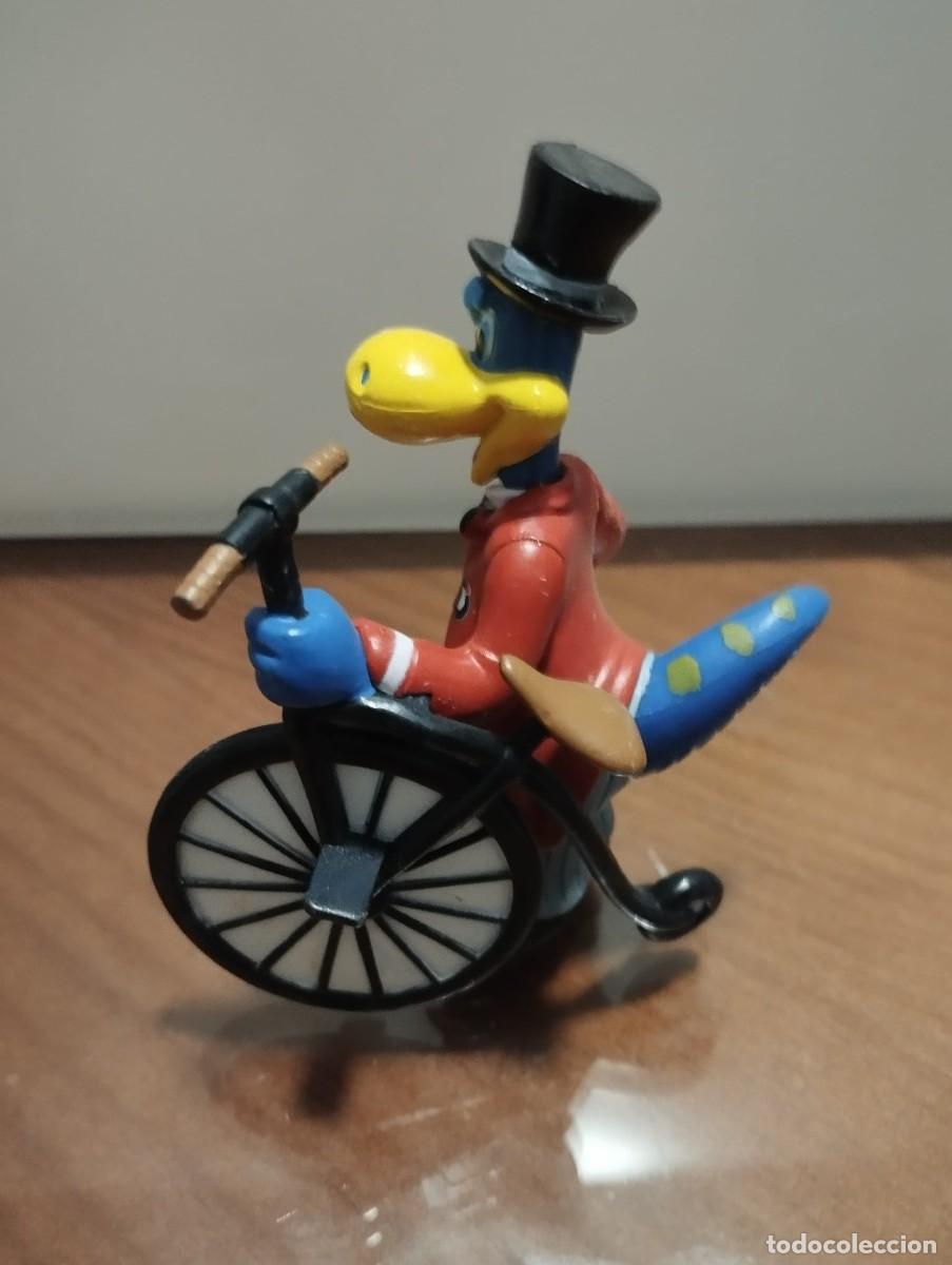 Figuras de goma y PVC: dino danonino ciclista