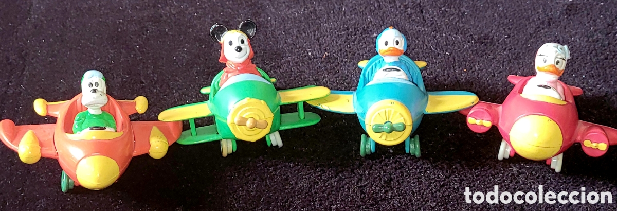 Figuras de goma y PVC: Bonito lote de 4 avionetas con figuras de Disney Mickey Donald Goofy Daisy