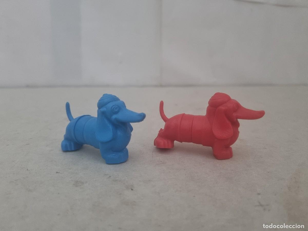 Figuras de goma y PVC: Lote de 2 tapones para cepillos de dientes oral B