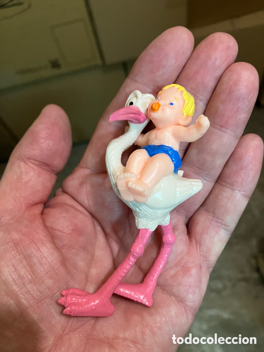 Figuras de goma y PVC: Comansi figuras de PVC. Cig&uuml;e&ntilde;a con beb&eacute;