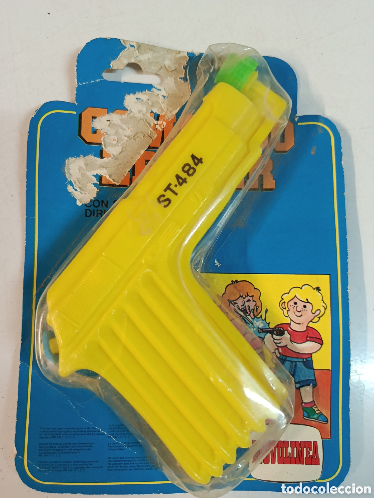 Figuras de goma y PVC: Pistola de agua amarilla Comansi Novolinea , sin usar en su embalaje