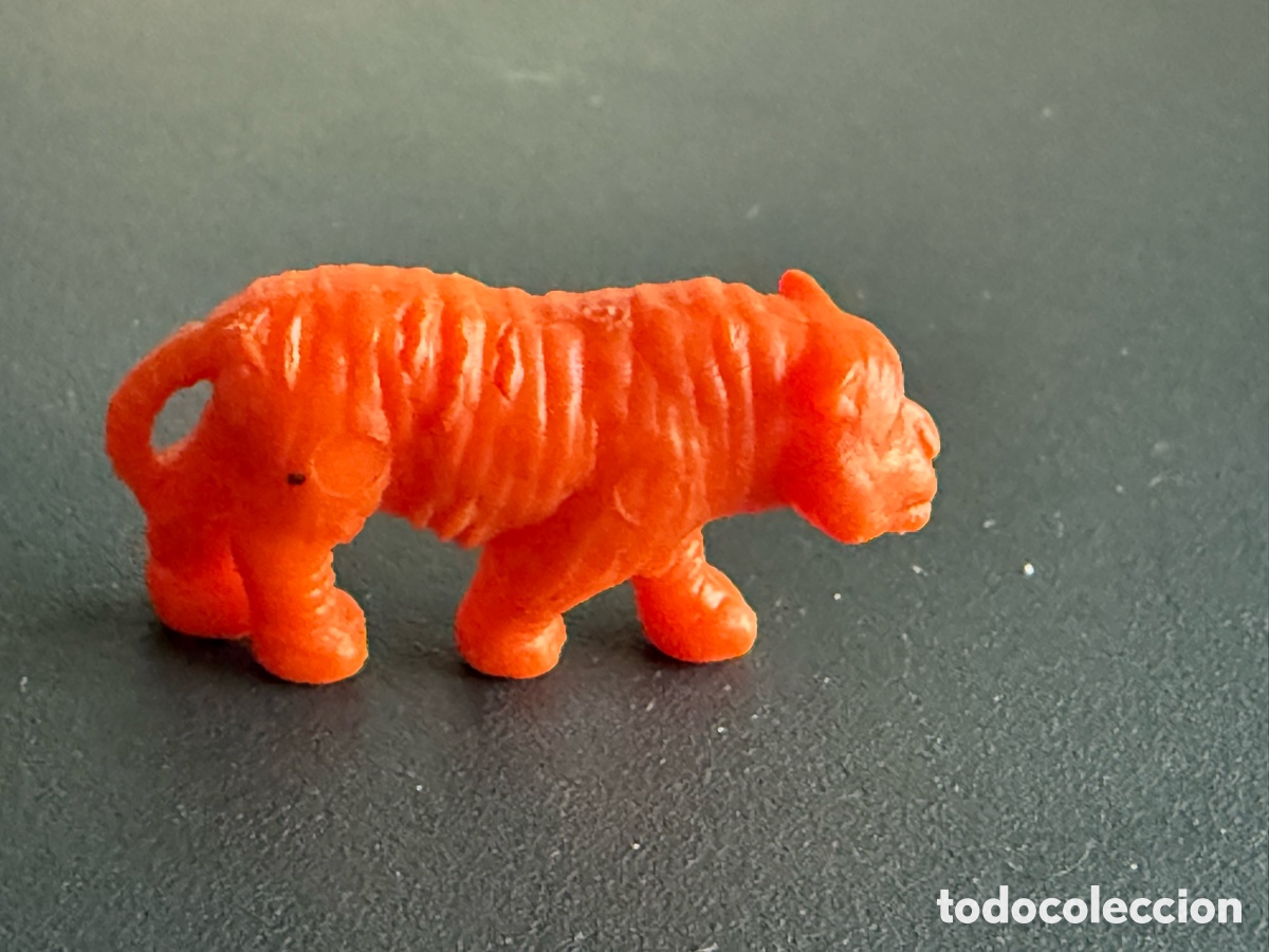 Figuras de goma y PVC: DUNKIN. TIGRE. Naranja. PHOSKITOS
