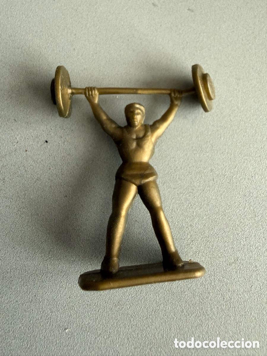 Figuras de Borracha e PVC: DUNKIN. CONGUITOS. OLIMPIADAS. HALTEROFILIA. una pesa algo suelta