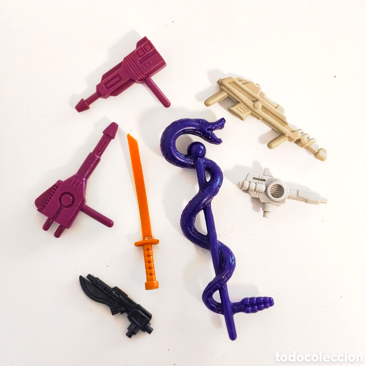 Figuras Masters del Universo: MASTERS DEL UNIVERSO, LOTE DE ARMAS DE DISTINTOS PERSONAJES Y JUEGOS. TRANSFORMERS