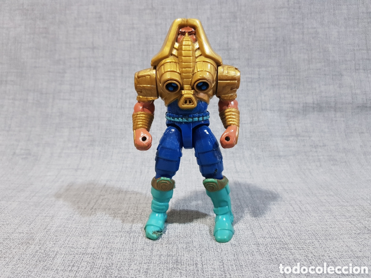 Figuras Masters del Universo: TUSKADOR. FIGURA ARTICULADA. MASTERS DEL UNIVERSO. MOTU. MALAYSIA. 1990.