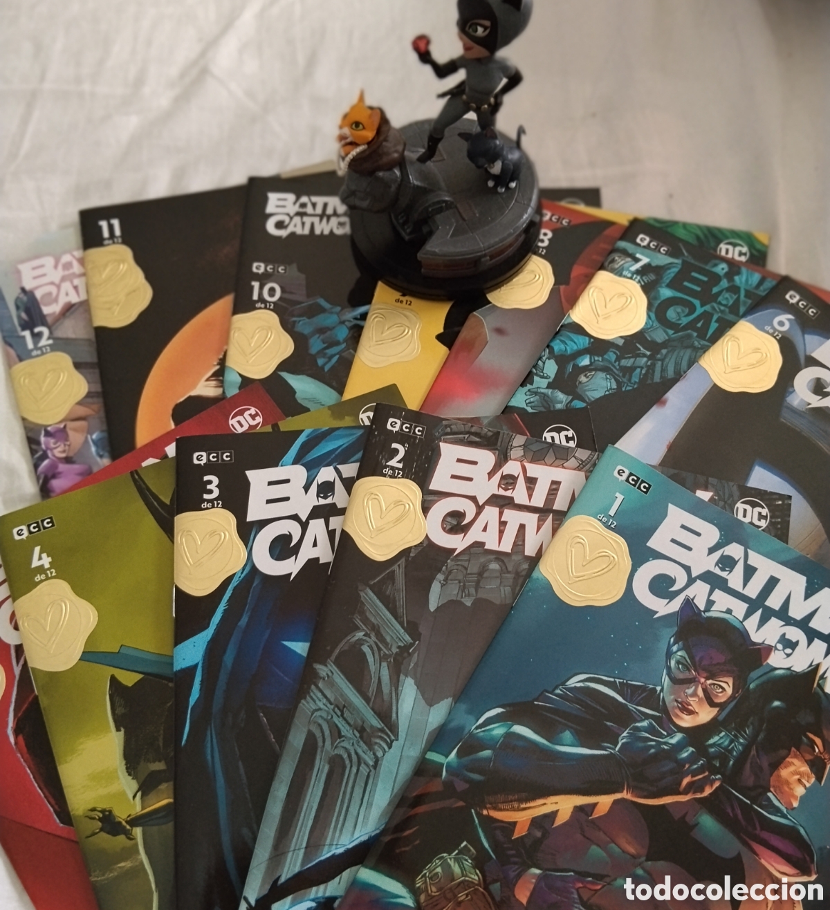 Figuras y mu&ntilde;ecos DC: Pack Batman/Catwoman Serie Completa (12 Grapas) + Figura Q-Fig Elite con Caja