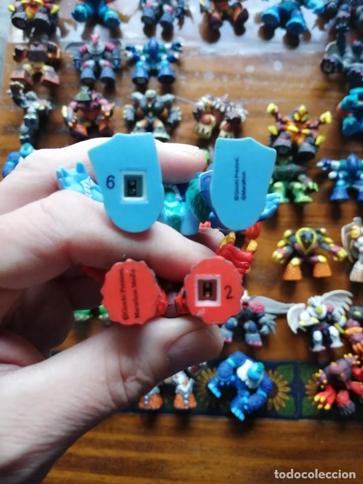 Figuras y mu&ntilde;ecos Gormiti: LOTE DE 55 GORMITIS CON CONECTORES PARA PLATAFORMA. - Foto 10