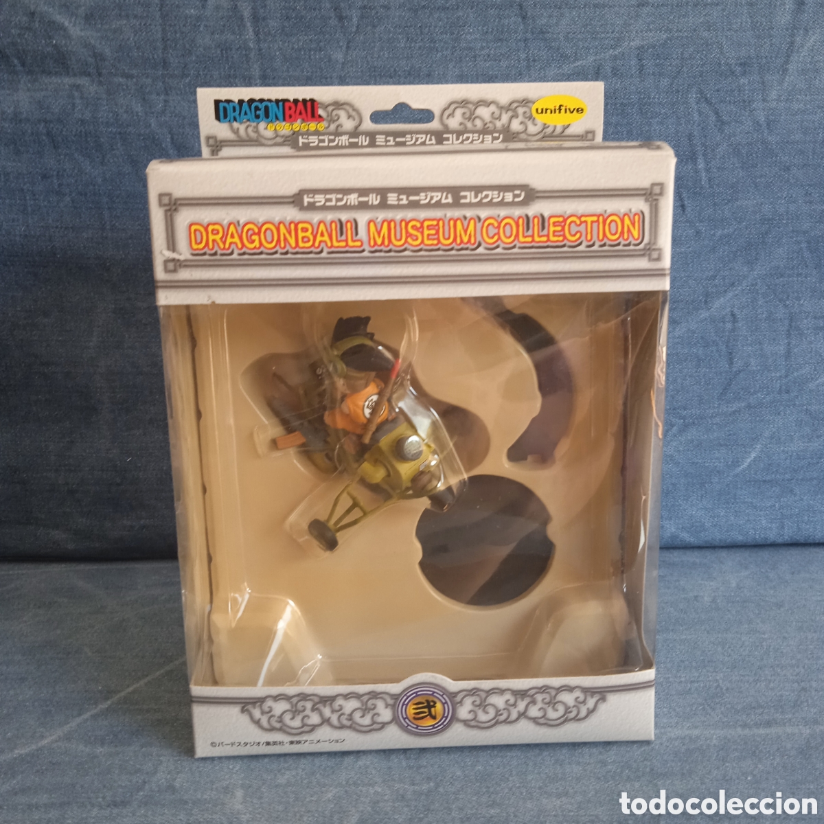 Figuras y mu&ntilde;ecos Manga: Figura Son Goku en veh&iacute;culo verde Dragon Ball Museum Collection modelo n&uacute;mero 2 Unifive Nueva 2005