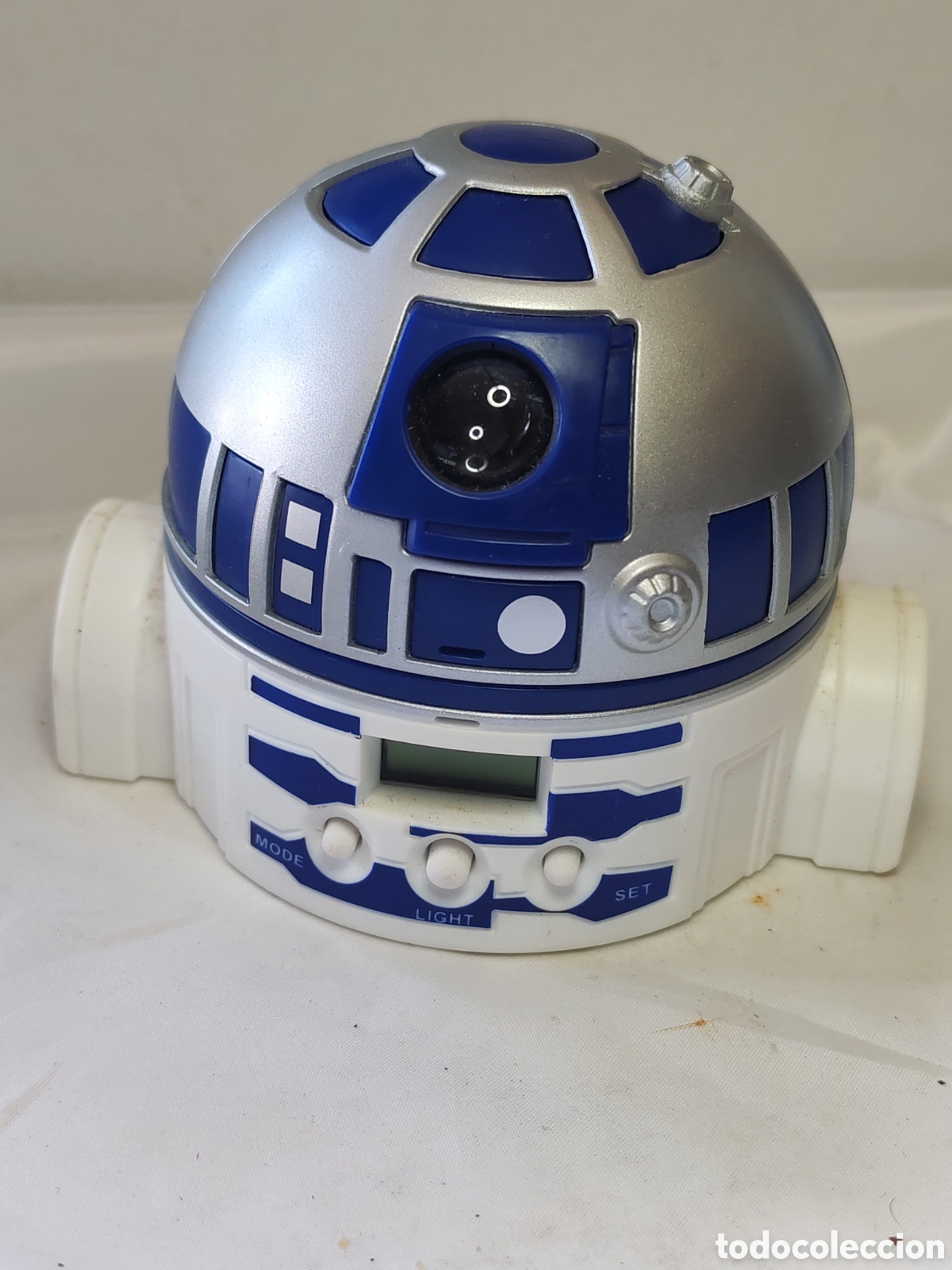 Figuras y Mu&ntilde;ecos Star Wars: STAR WARS. Reloj despertador con el dise&ntilde;o de R2D2. Colacao. Idilia Foods. Espa&ntilde;a.