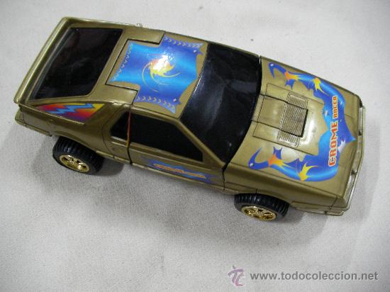 Figuras y mu&ntilde;ecos Transformers: ANTIGUO ROBOT TRANSFORMERS COCHE ELECTRICO - Foto 1