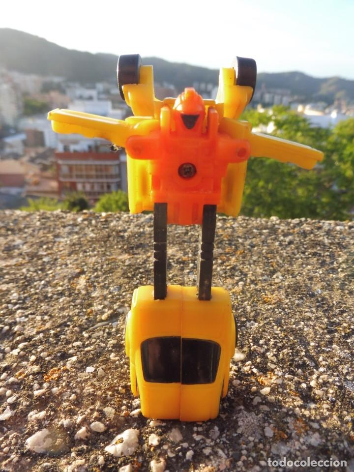 Figuras y mu&ntilde;ecos Transformers: Transformers mini micro coche amarillo sin marca bootleg pl&aacute;stico kiosko - Foto 1