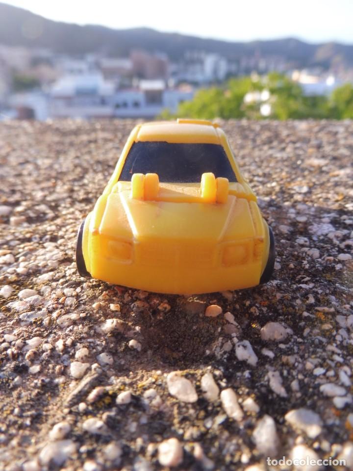 Figuras y mu&ntilde;ecos Transformers: Transformers mini micro coche amarillo sin marca bootleg pl&aacute;stico kiosko - Foto 3