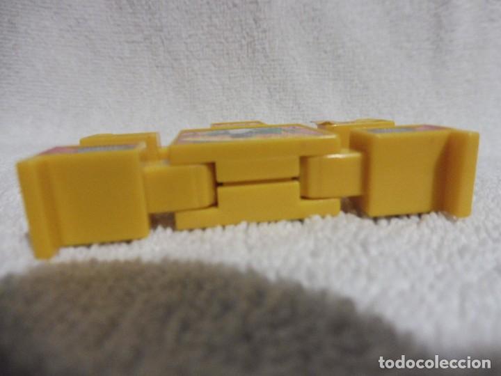 Figuras y mu&ntilde;ecos Transformers: Robot NakNak amarillo articulado, Hasbro 2002 - Foto 4